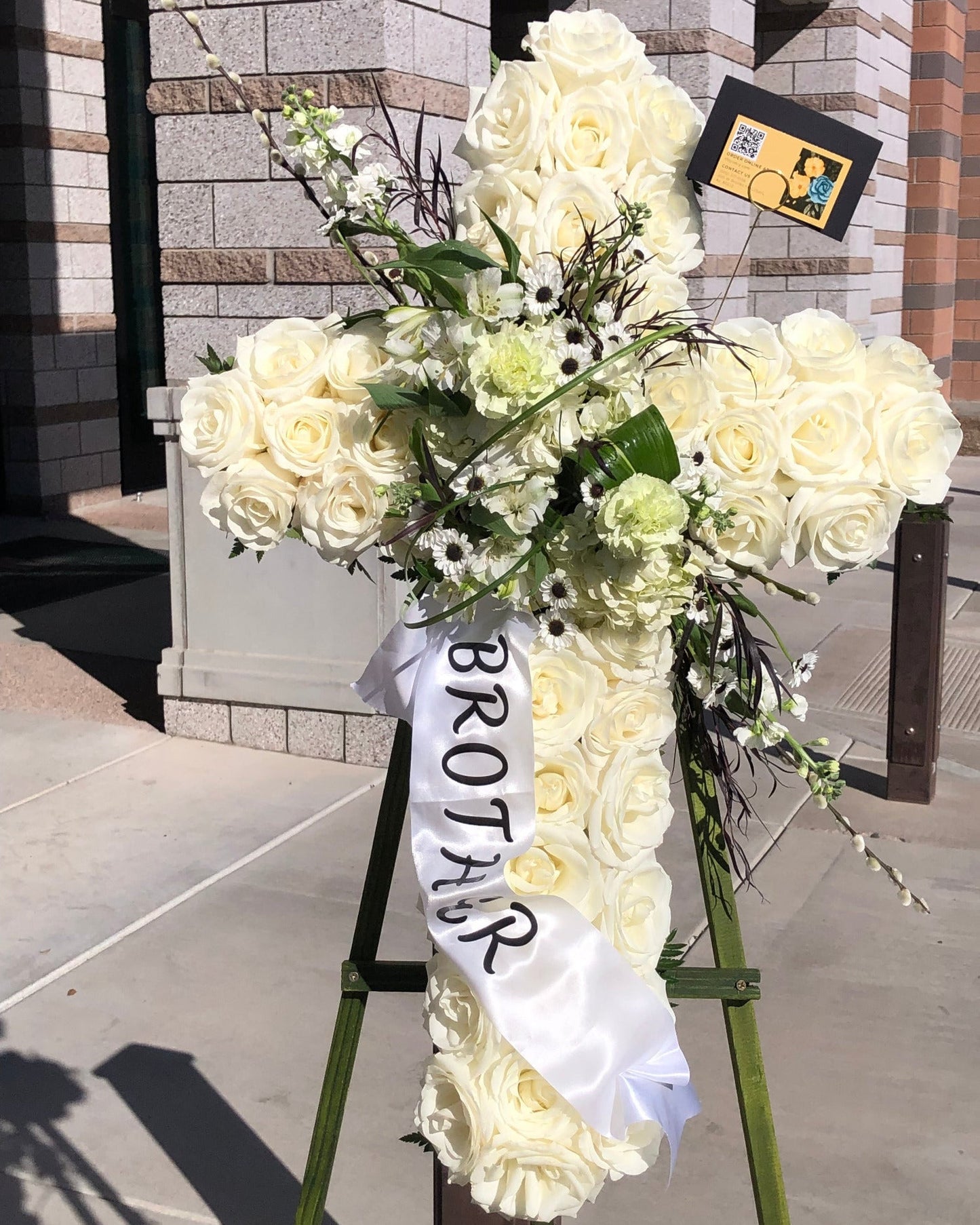 Elegant funeral cross flower stand for memorial services with local delivery in Gilbert, Chandler, Tempe, Queen Creek, and Mesa Arizona.