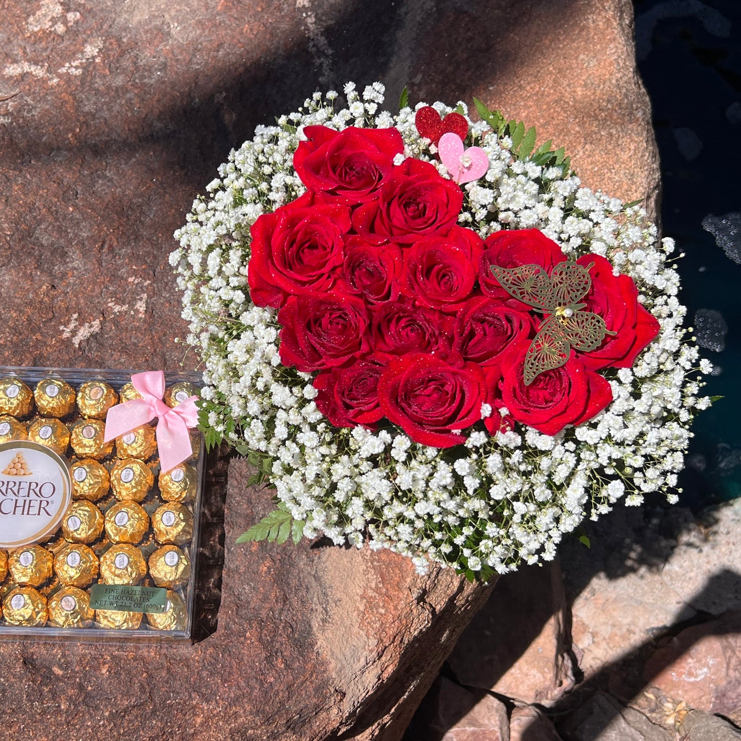 Heart-shaped roses arrangement with fresh red roses, perfect for romantic occasions and same day flower delivery.