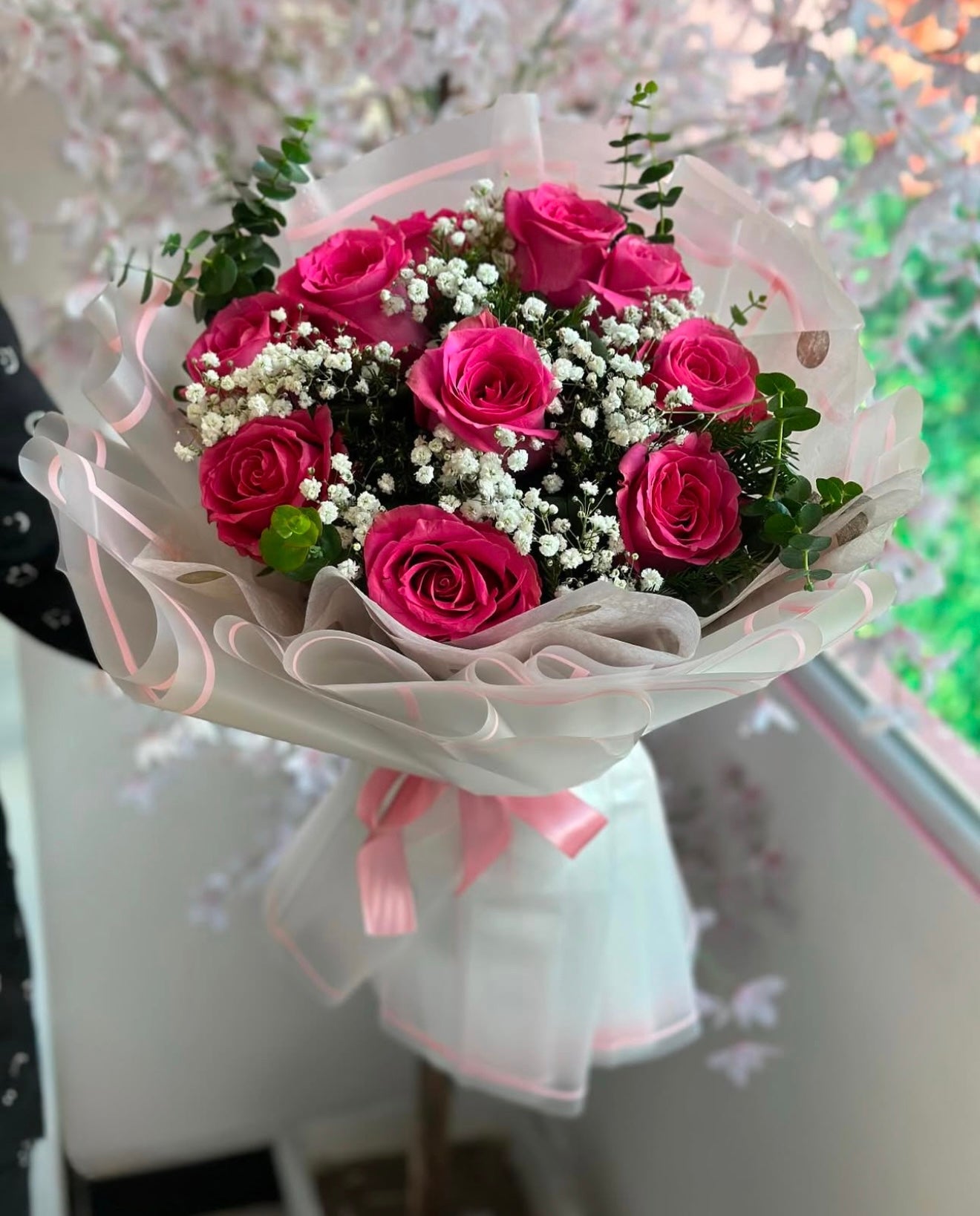 Pink Roses With Baby Breath Designed Wrapping Waterproof Paper, available for same day flower delivery in Phoenix, Gilbert, Chandler, Mesa, Tempe, Queen Creek