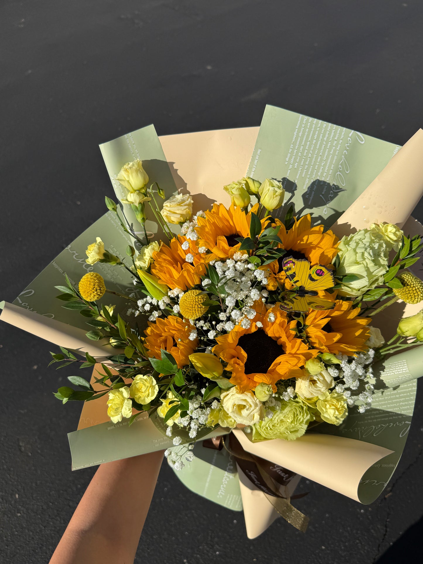 Our Yellow Mix Bouquet combines radiant blooms like roses, sunflowers, and seasonal accents
