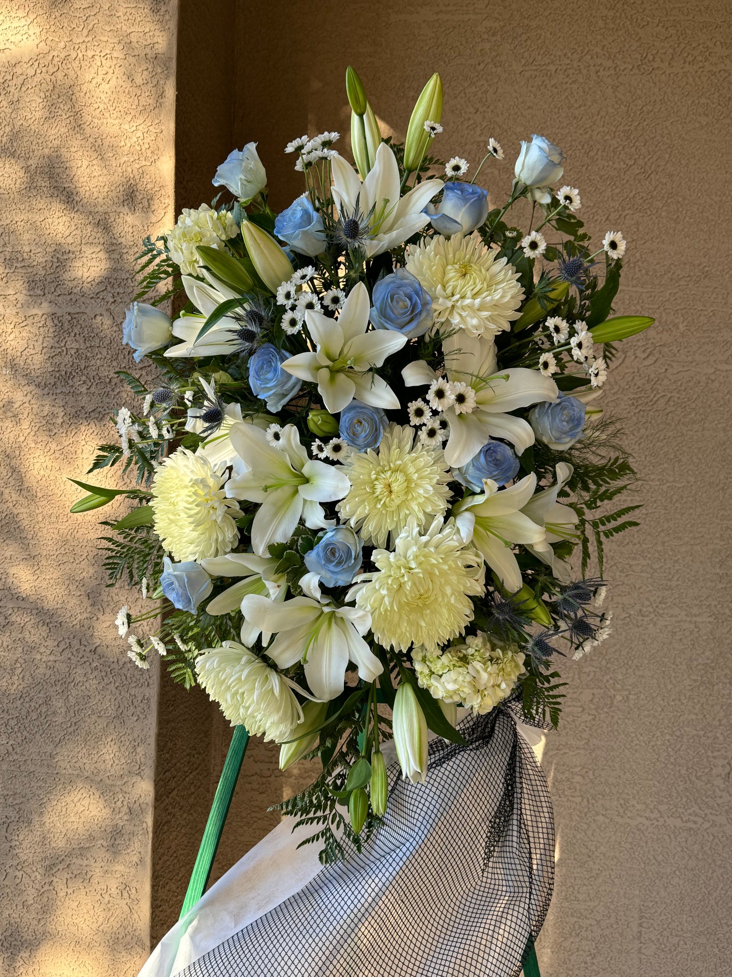 Blue & White Funeral Standing Spray
