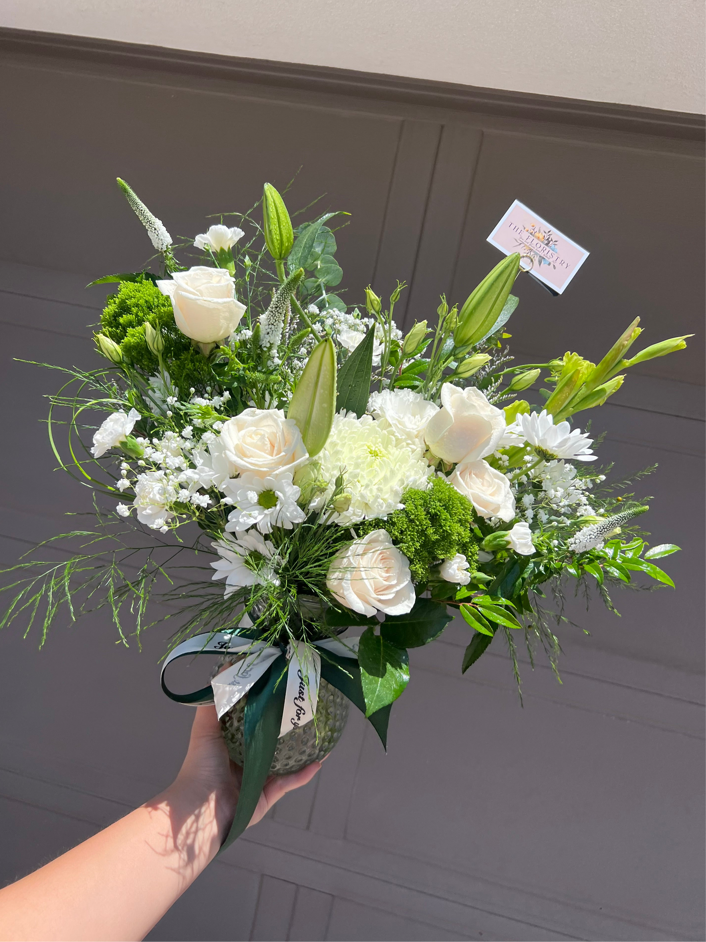 Bouquet of white and green flowers with white selection. Available for delivery in Phoenix area, Gilbert, Mesa, Chandler, Tempe, Queen Creek