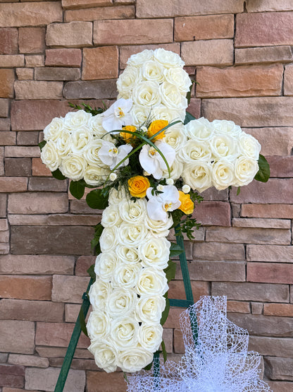 Floral cross stand funeral arrangement available for delivery in Gilbert, Chandler, Tempe, Queen Creek, and Mesa with elegant sympathy flowers.
