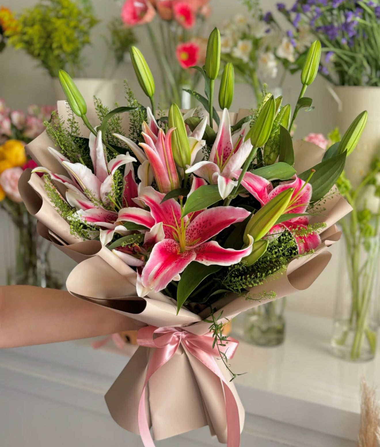 Classic. Elegant. Sophisticated. Our Korean wrapped lily bouquet brings all of these qualities to life, while bringing you closer to the people you love.