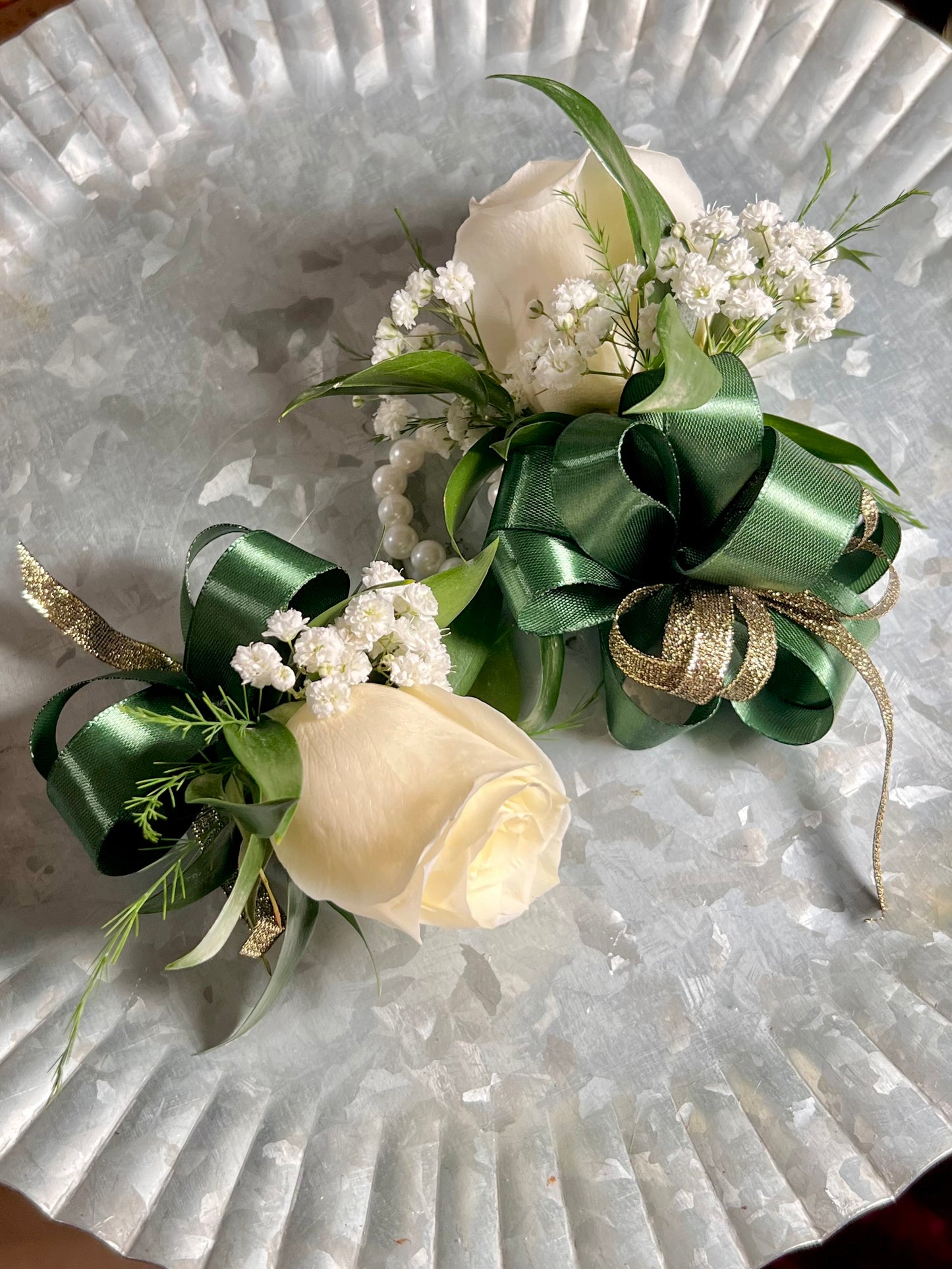 Hunter green corsage and boutonniere for prom dance, home coming