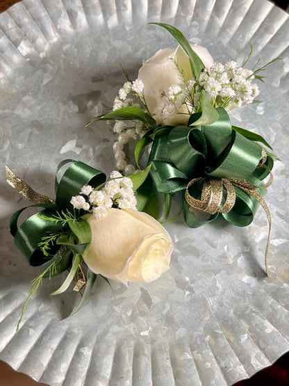 Hunter green corsage and boutonniere for prom dance, home coming