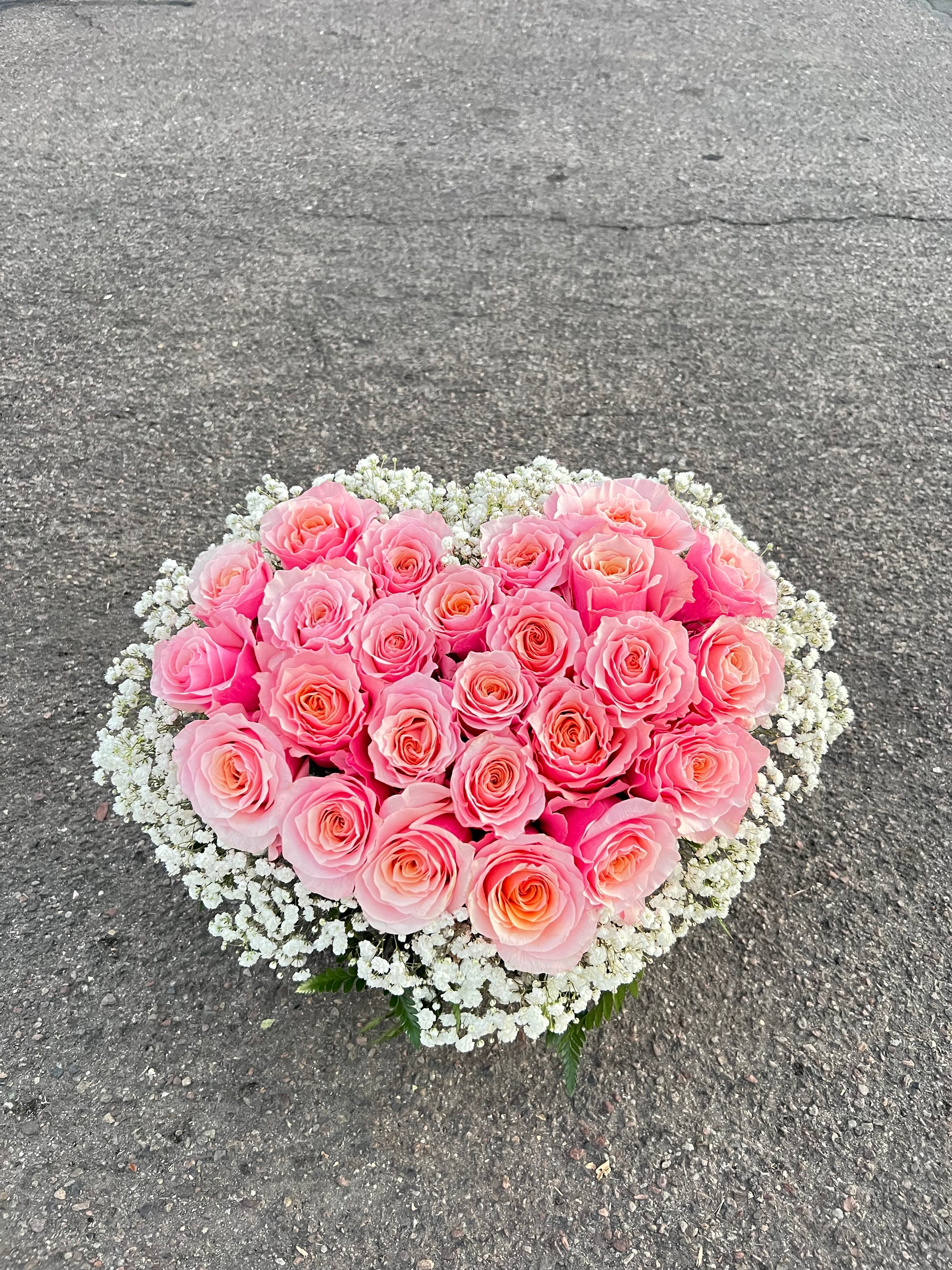 Elegant red roses heart arrangement, available for online order and florist same day delivery.