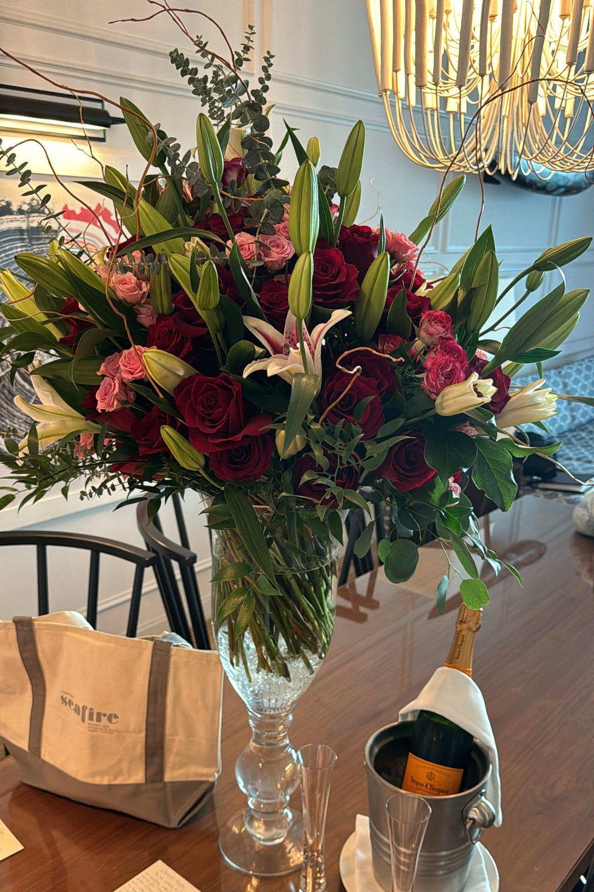 an outstanding luxury floral arrangement designed to make a bold, timeless statement. Featuring graceful, fragrant lilies paired with long-stem premium red roses, this masterpiece embraces elegance, passion, and refined beauty in every stem.
