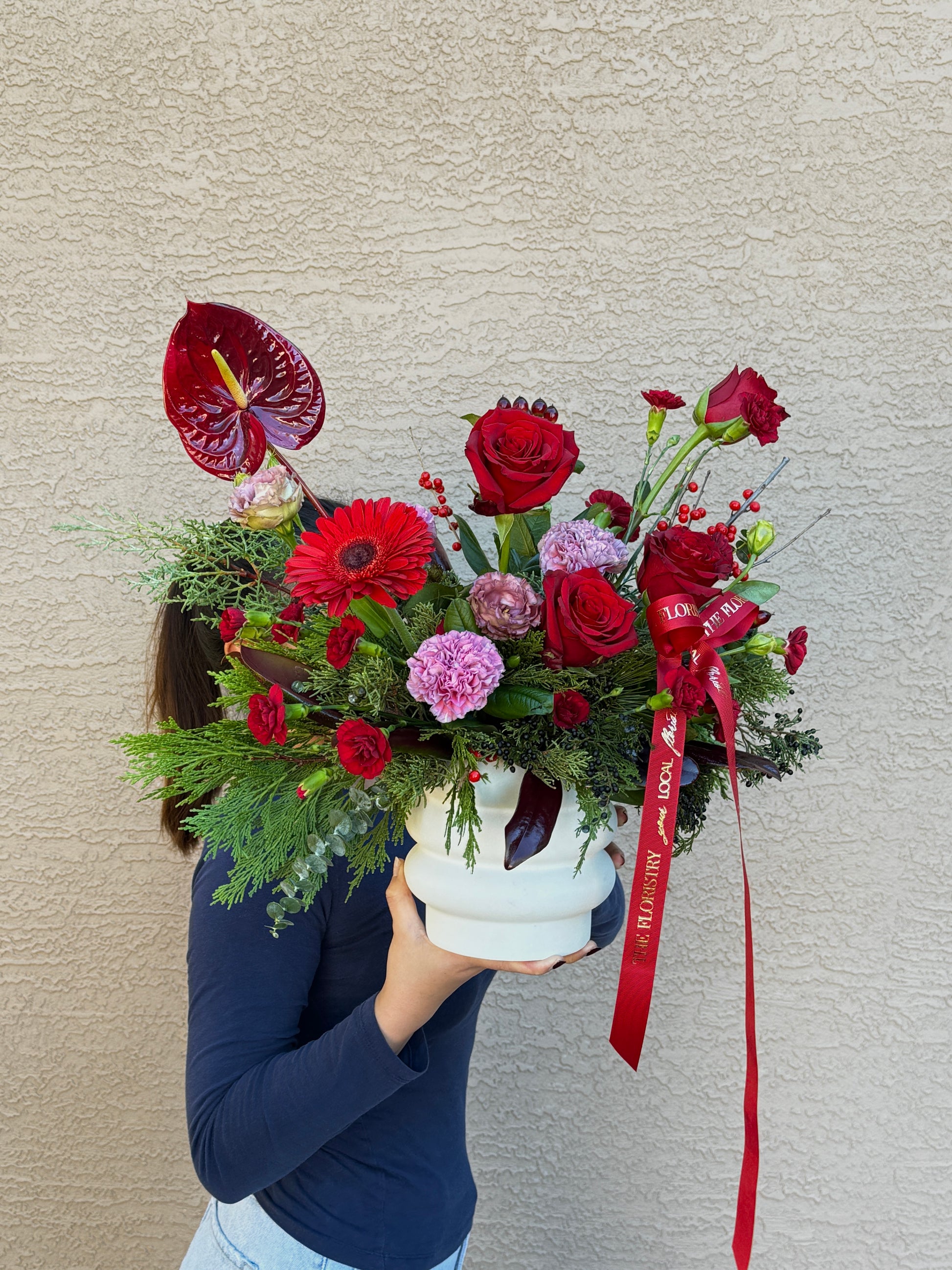 Bold red and burgundy floral centerpiece with white blooms, designed in our Florist’s Choice style. Romantic, luxurious, and perfect for intimate celebrations.