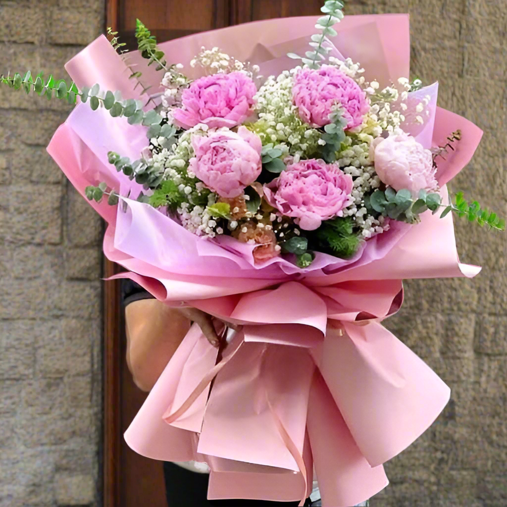 Rich Fuchsia Pink Peony Flower this Mother's Day week.
 The bouquet features five or ten peonies with blushing roses and delicate baby's breath, a charming blend of beauty and grace.