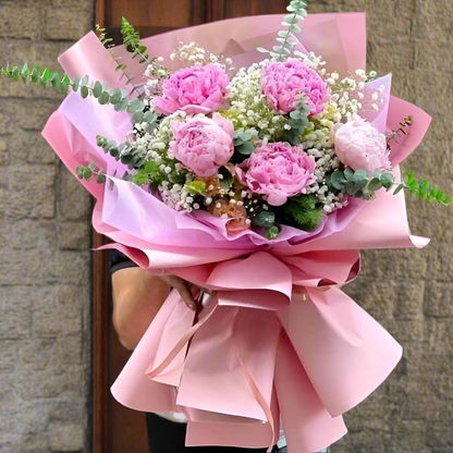 Rich Fuchsia Pink Peony Flower this Mother's Day week.
 The bouquet features five or ten peonies with blushing roses and delicate baby's breath, a charming blend of beauty and grace.
