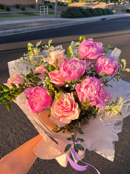 Rich Fuchsia Pink Peony Flower this Mother's Day week.
 The bouquet features five or ten peonies with blushing roses and delicate baby's breath, a charming blend of beauty and grace.
