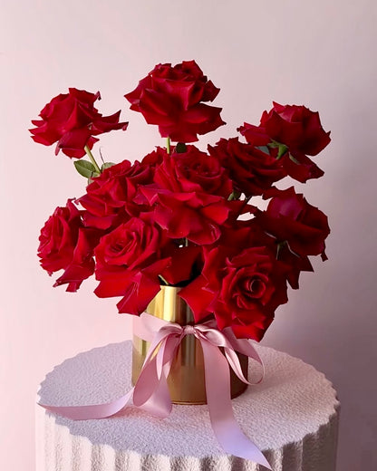 Classy red roses only centerpiece styled in a modern, artistic cloud arrangement