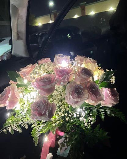 Fresh pink roses floral arrangement in vase, ideal gift for any occasion.