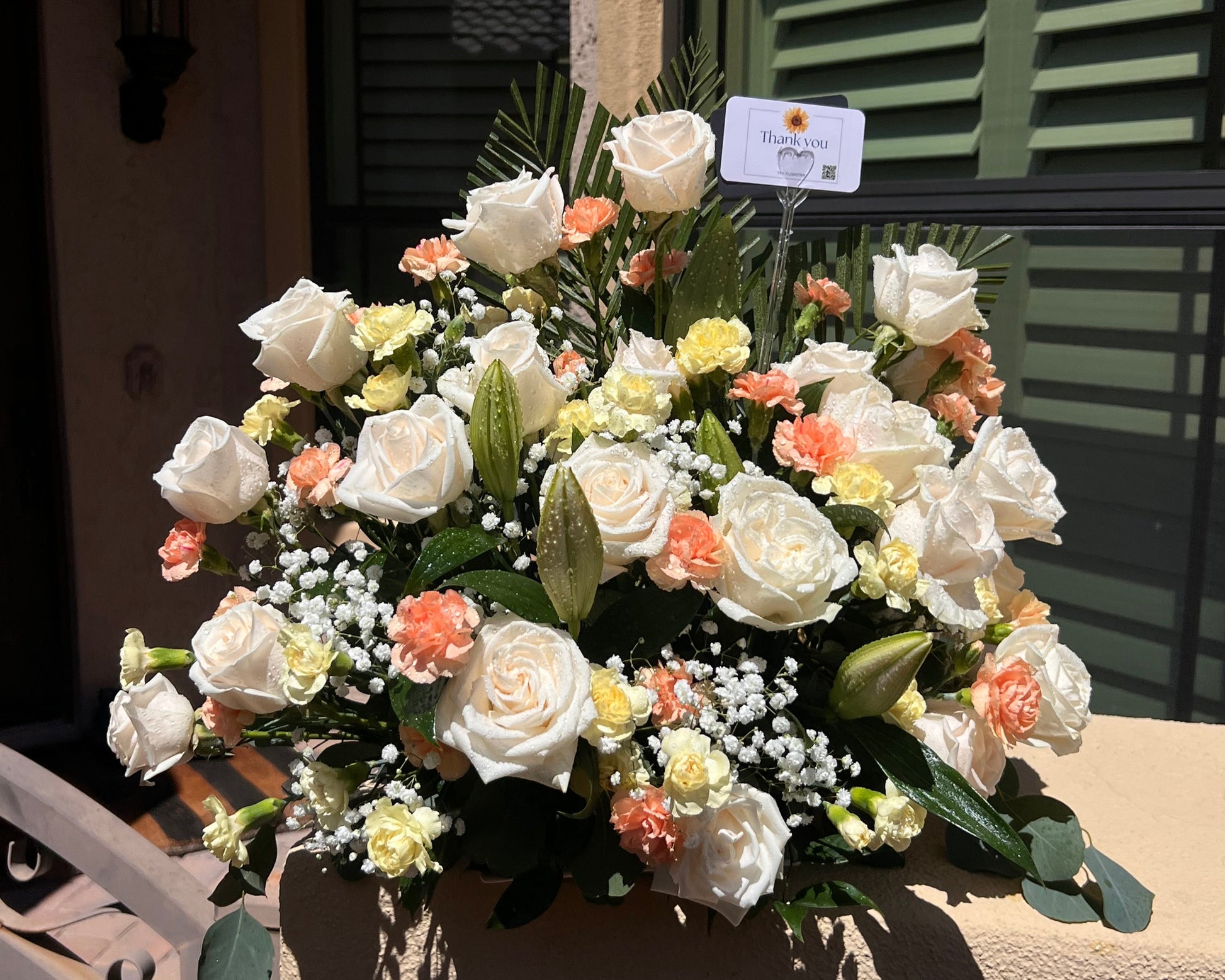 Elegant soft roses bouquet in cream and peach shades, designed by florists with same day delivery.
