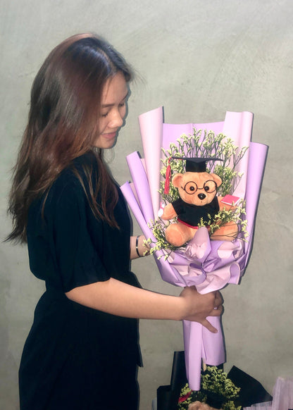 Graduation bouquet with statice, lumonium, and baby’s breath
